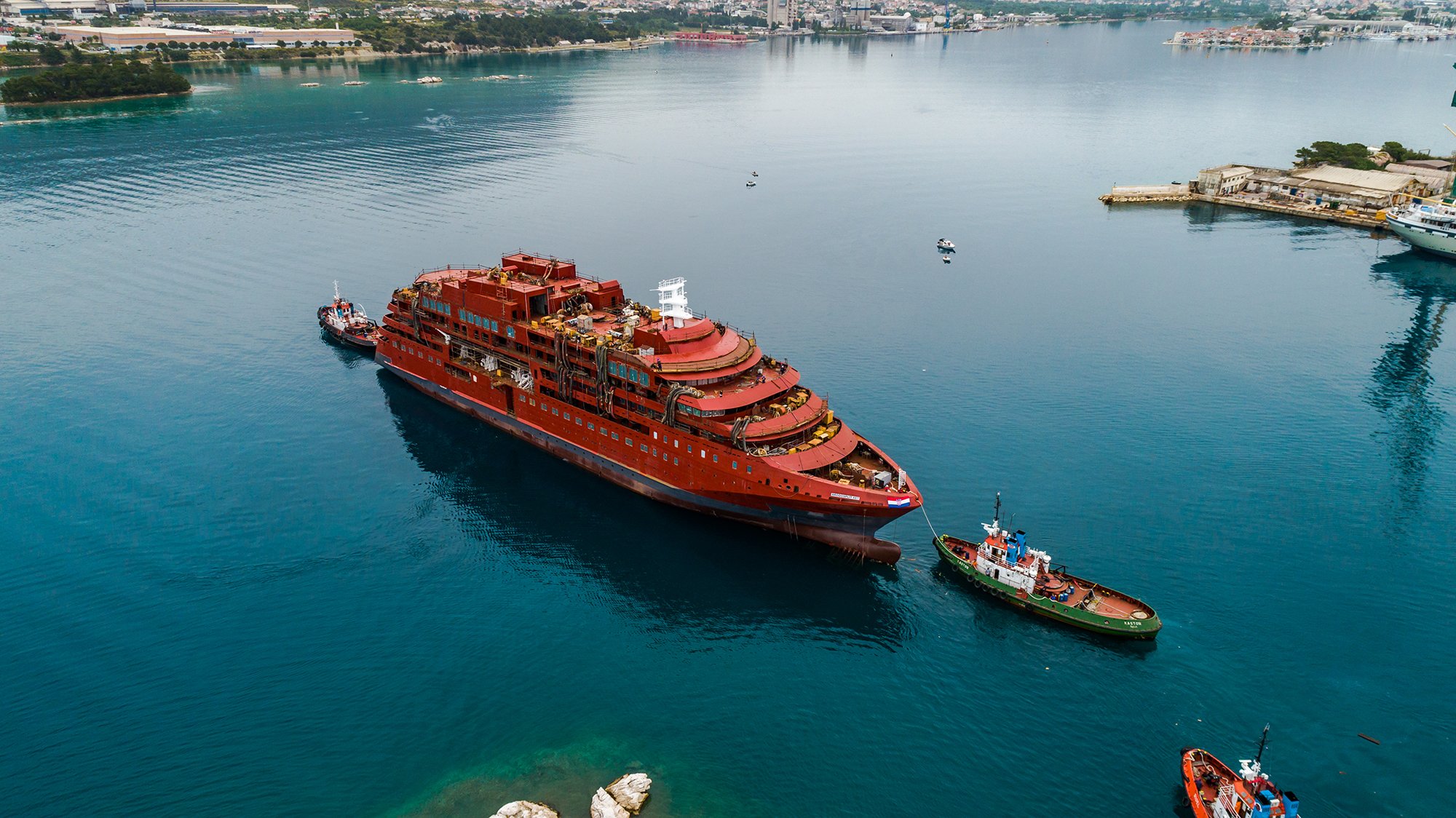 Aerial photo of Ultramarine in the water after its launch from slipway in Split, Croatia. 